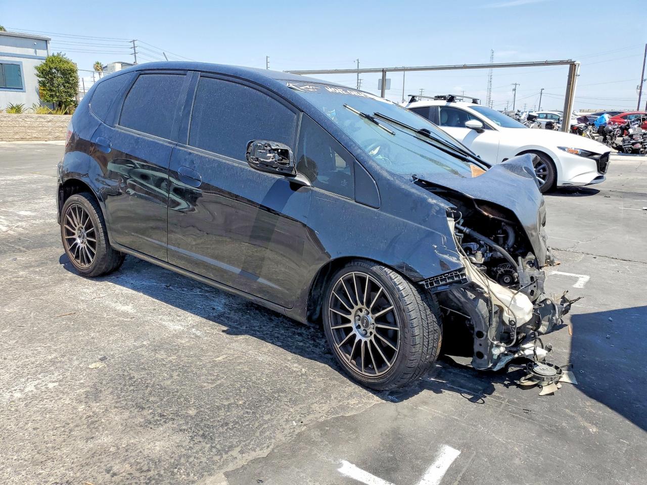 JHMGE8H30BS010983 · 2011 HONDA FIT · 4/12
