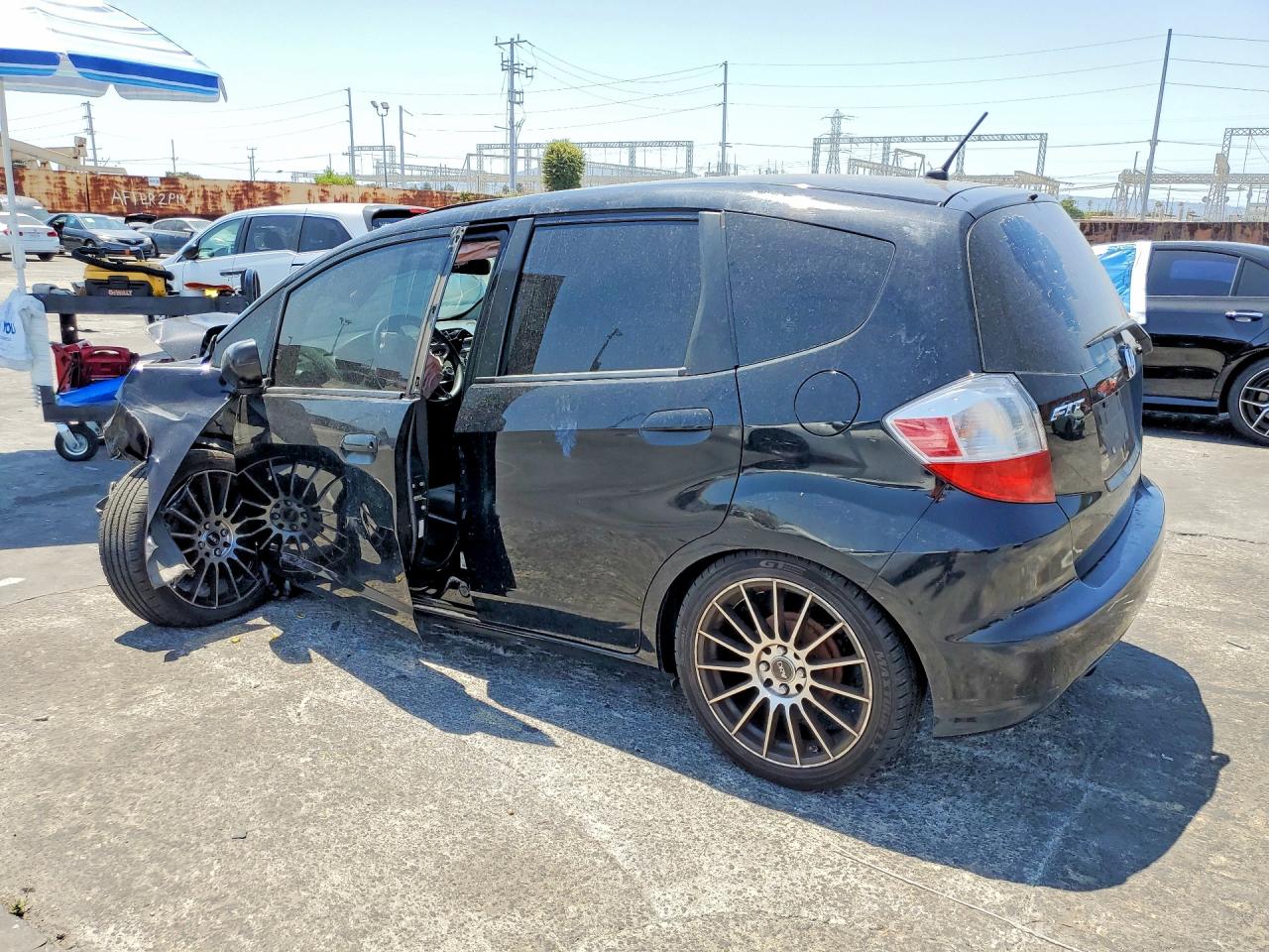 JHMGE8H30BS010983 · 2011 HONDA FIT · 2/12