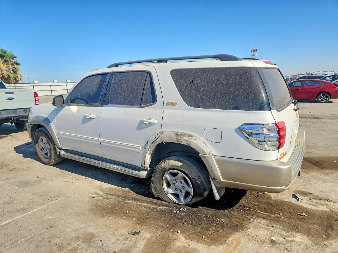 5TDZT34A71S044210 · 2001 TOYOTA SEQUOIA · 2/13
