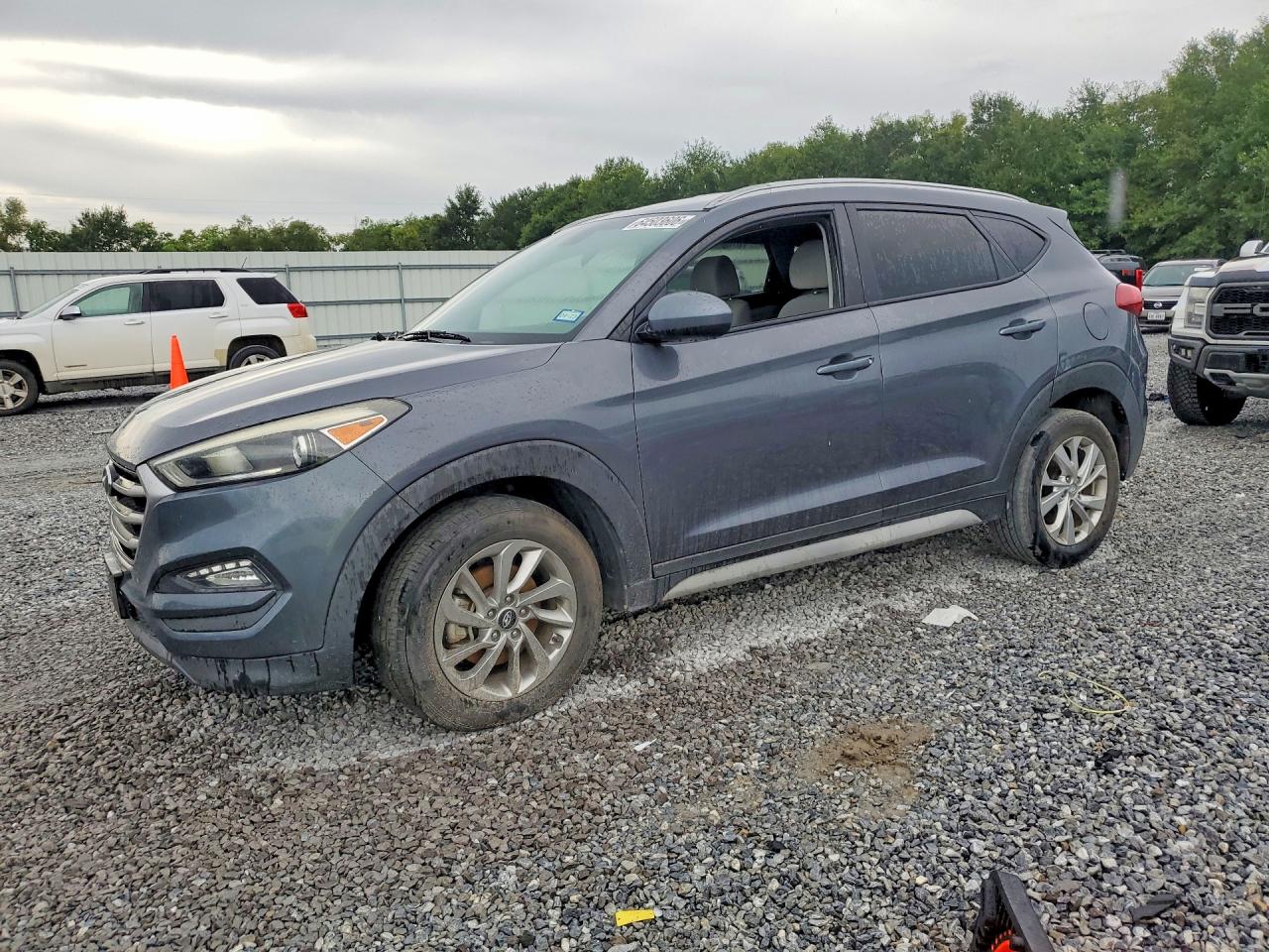KM8J3CA41JU676168 · 2018 HYUNDAI TUCSON