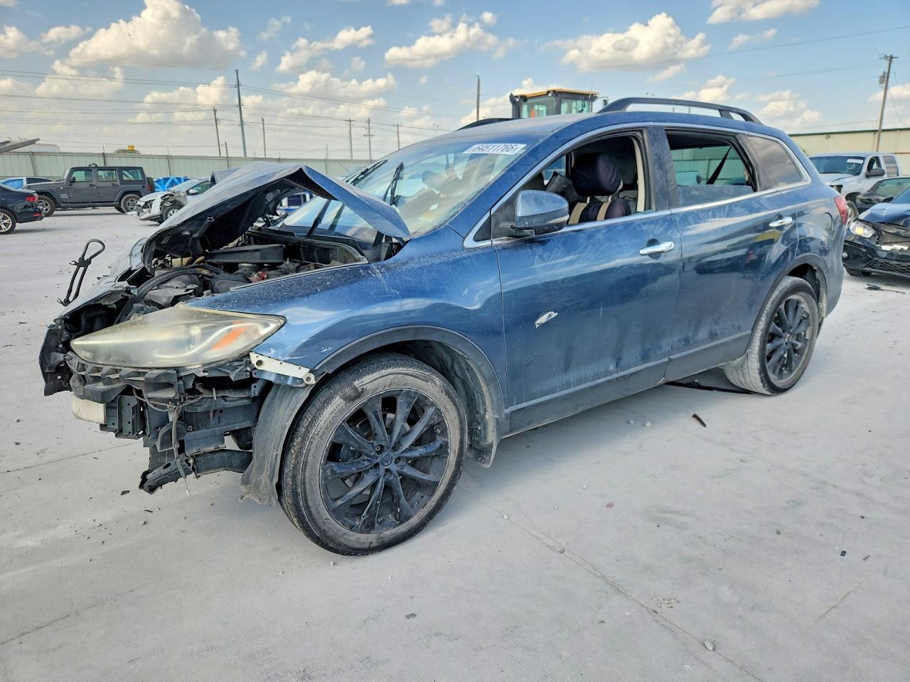 JM3TB2DA6E0427381 · 2014 MAZDA CX-9