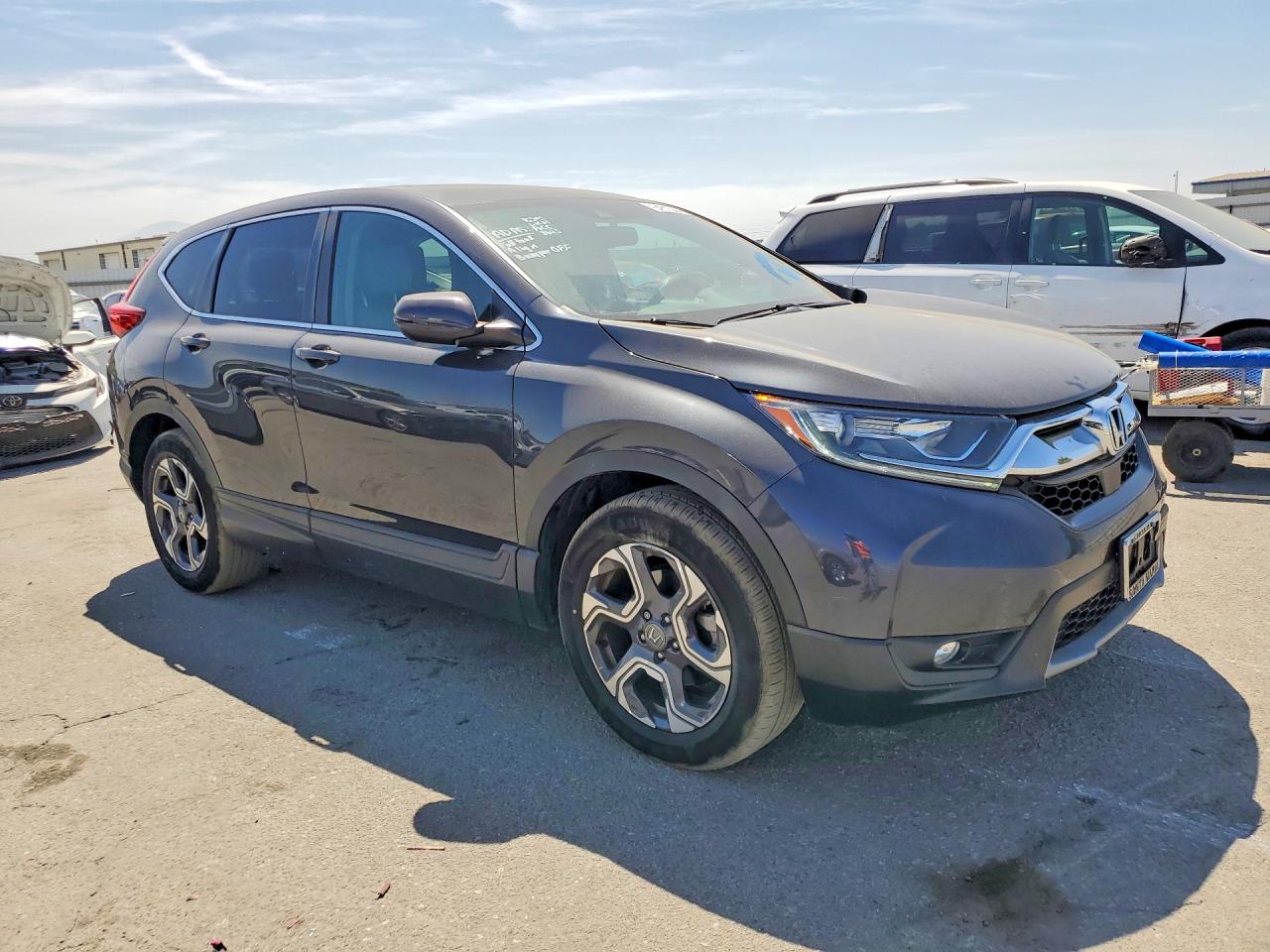 7FARW1H83JE023219 · 2018 HONDA CR-V · 4/12