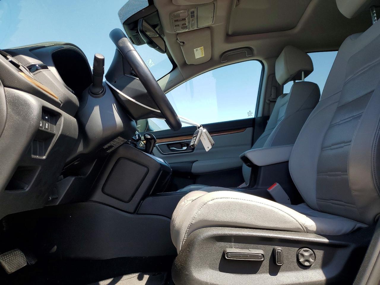 7FARW1H83JE023219 · 2018 HONDA CR-V · 7/12