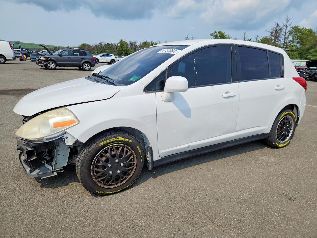 3N1BC13E19L404070 · 2009 NISSAN VERSA