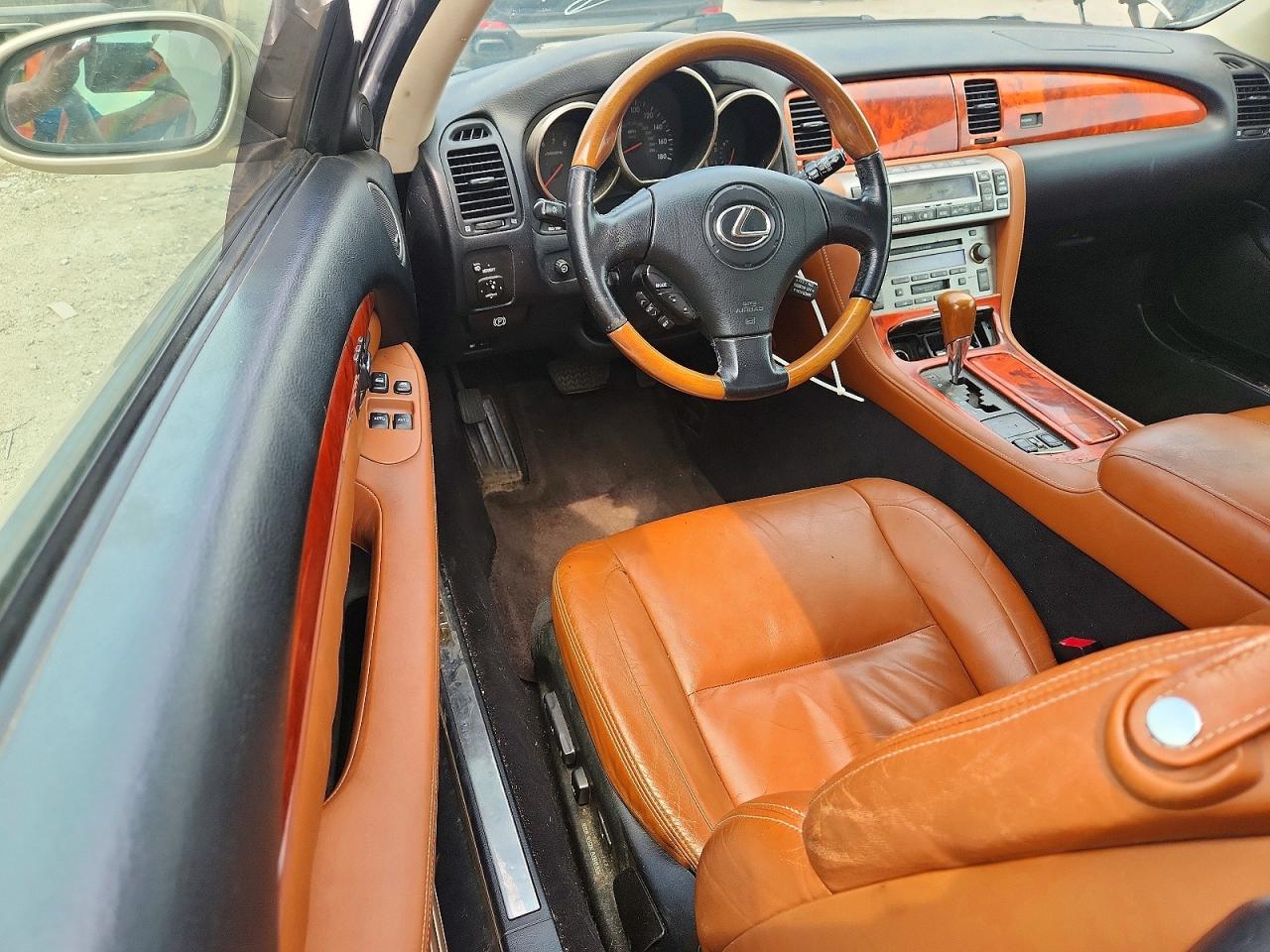 JTHFN48YX20001395 · 2002 LEXUS SC · 8/12
