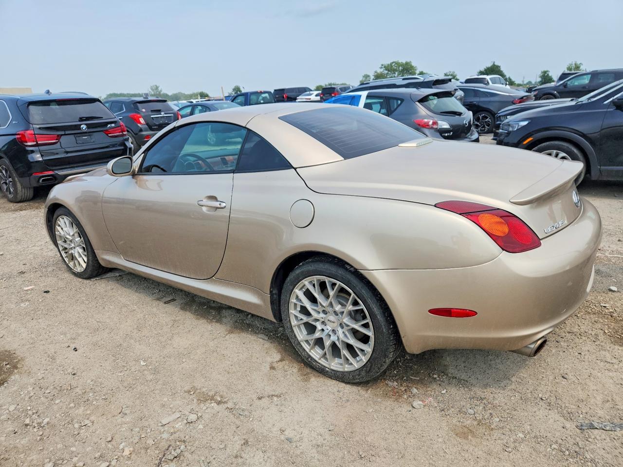 JTHFN48YX20001395 · 2002 LEXUS SC · 2/12
