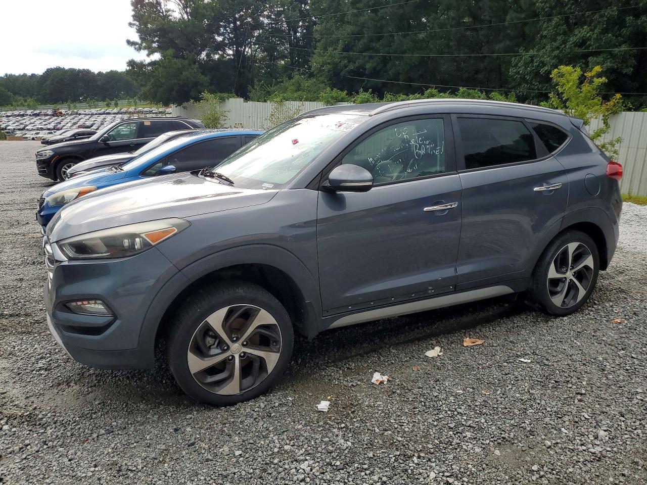 KM8J33A23HU352289 · 2017 HYUNDAI TUCSON