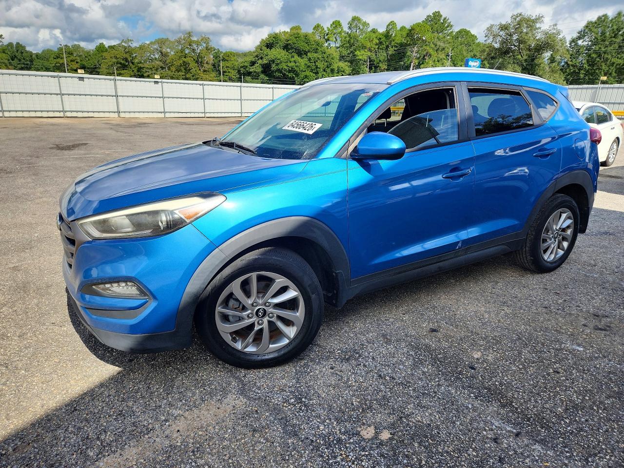 KM8J33A40GU125819 · 2016 HYUNDAI TUCSON