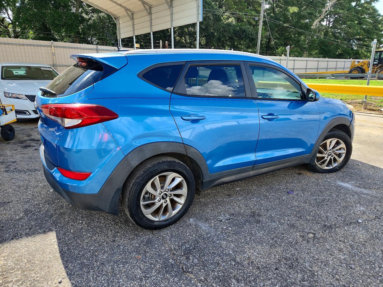 KM8J33A40GU125819 · 2016 HYUNDAI TUCSON · 3/13