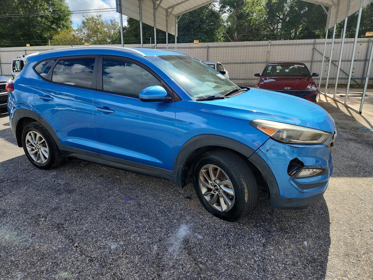 KM8J33A40GU125819 · 2016 HYUNDAI TUCSON · 4/13