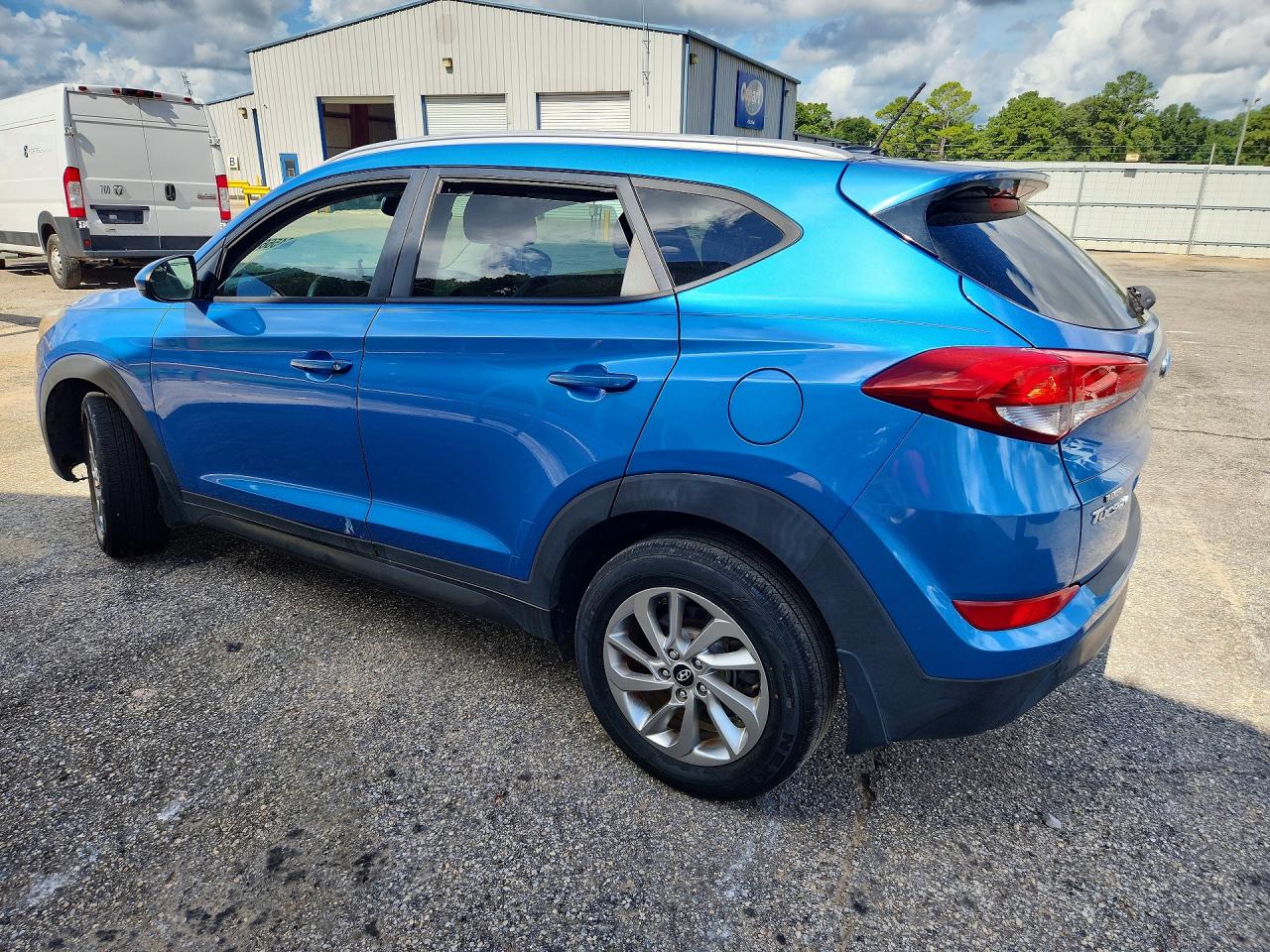 KM8J33A40GU125819 · 2016 HYUNDAI TUCSON · 2/13