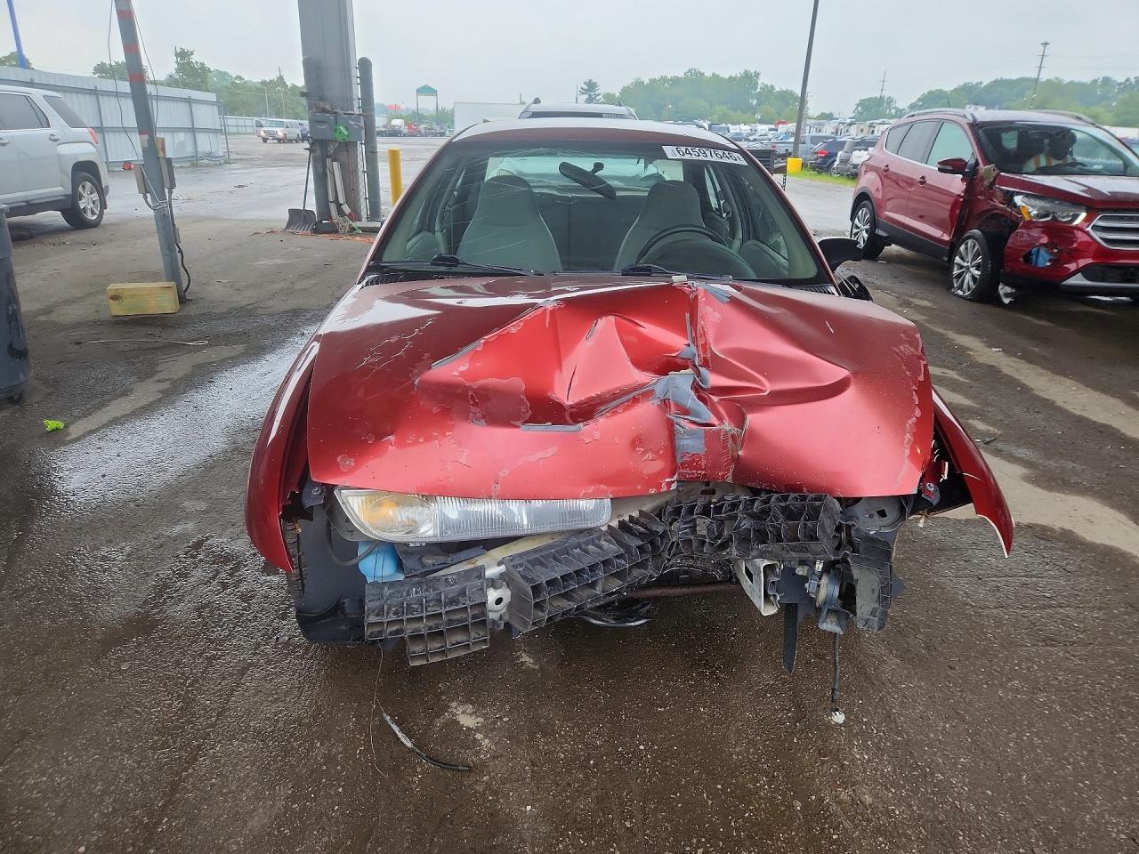 1G8ZH5283XZ371167 · 1999 SATURN SL1 · 5/12