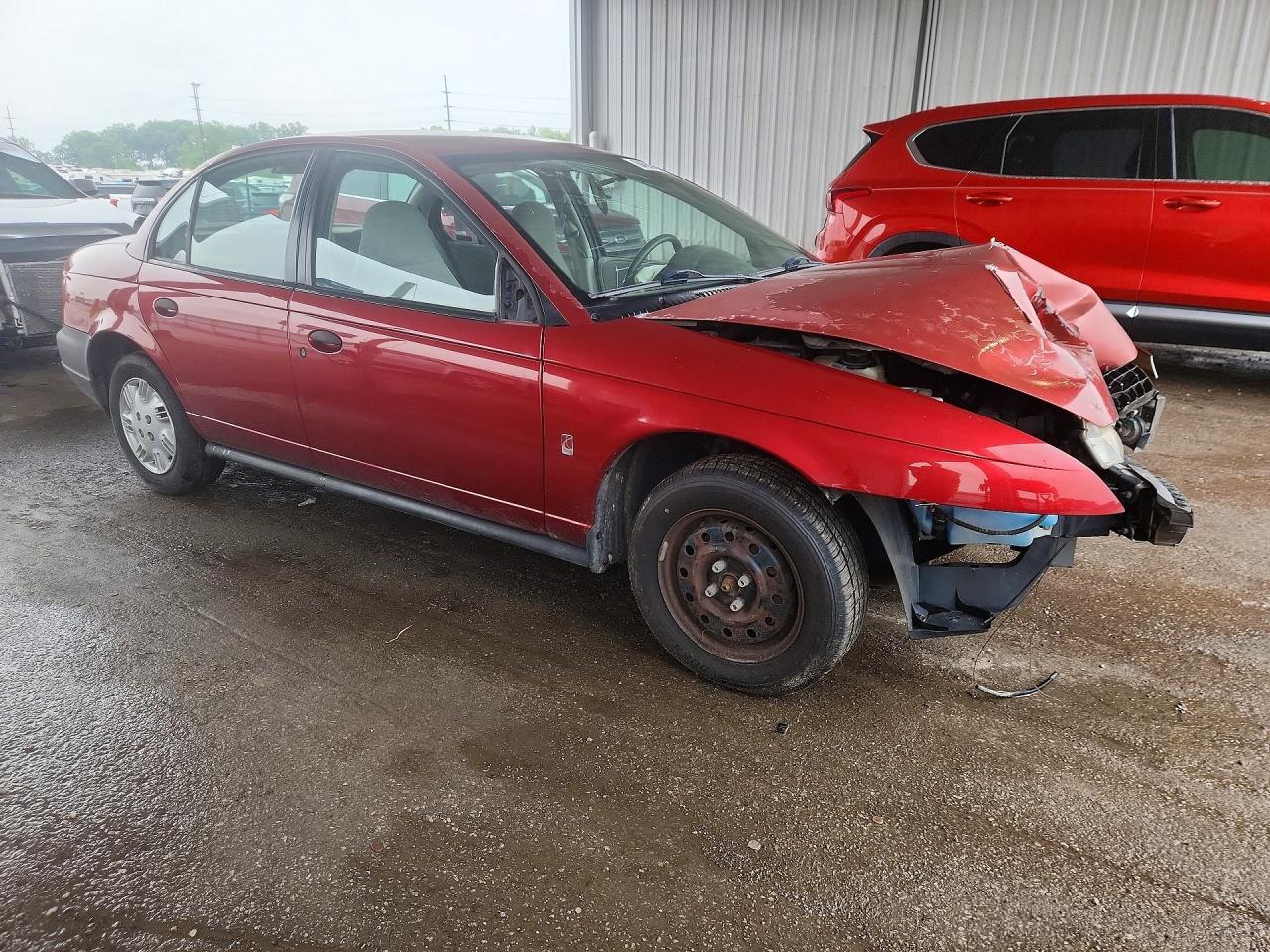 1G8ZH5283XZ371167 · 1999 SATURN SL1 · 4/12