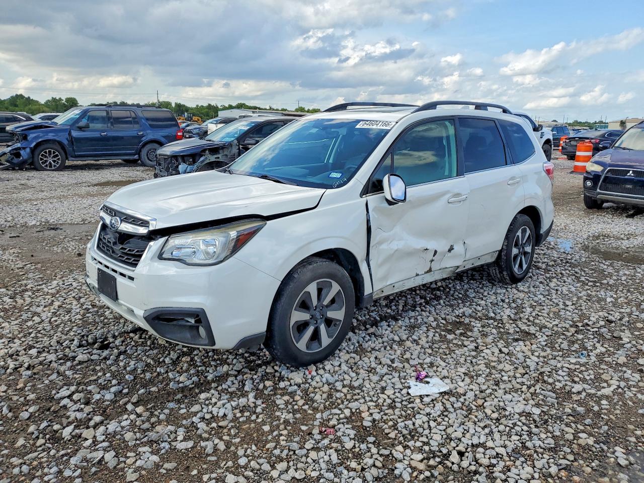 JF2SJAJC1JH486147 · 2018 SUBARU FORESTER