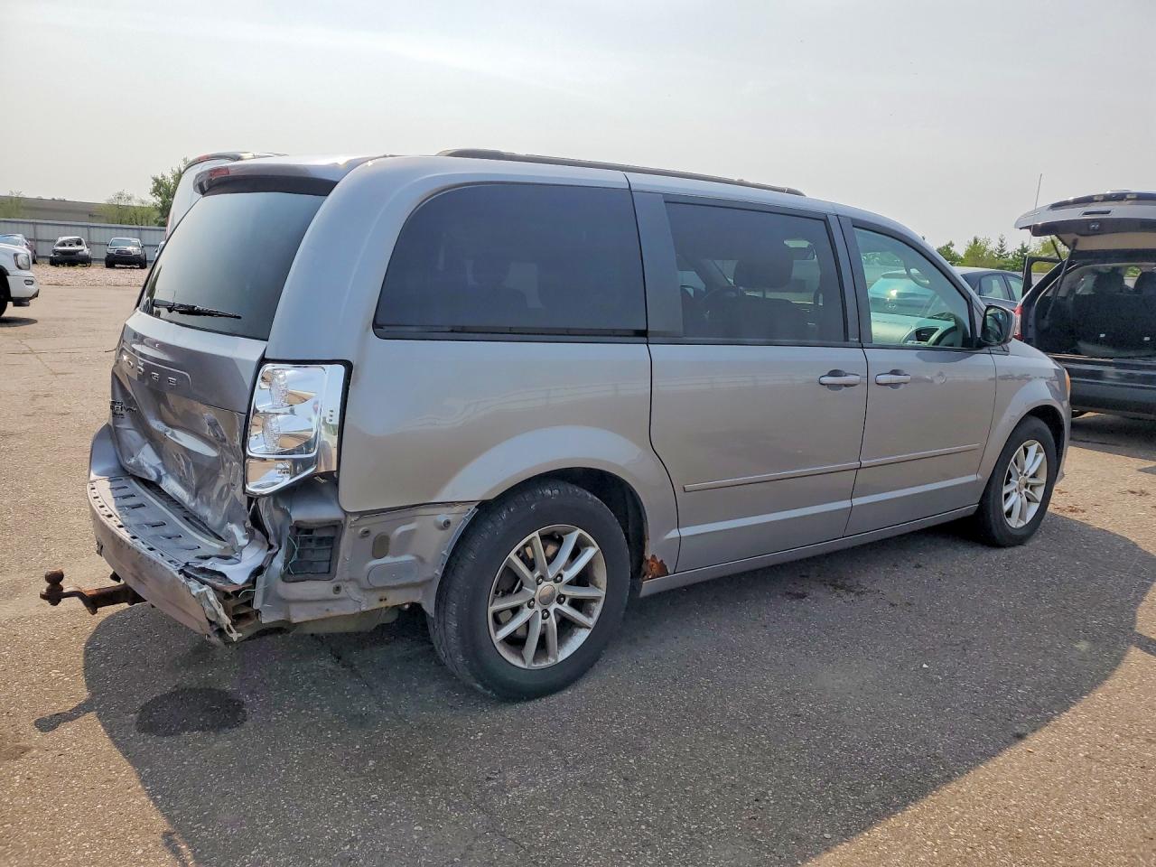 2C4RDGCG9ER154829 · 2014 DODGE GRAND CARAVAN · 3/13