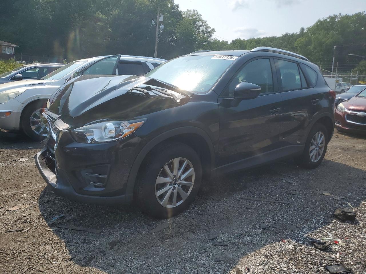 JM3KE4BY3G0899121 · 2016 MAZDA CX-5