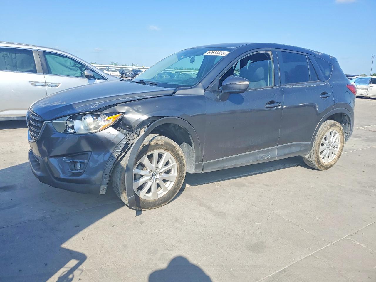 JM3KE2CY2G0726337 · 2016 MAZDA CX-5