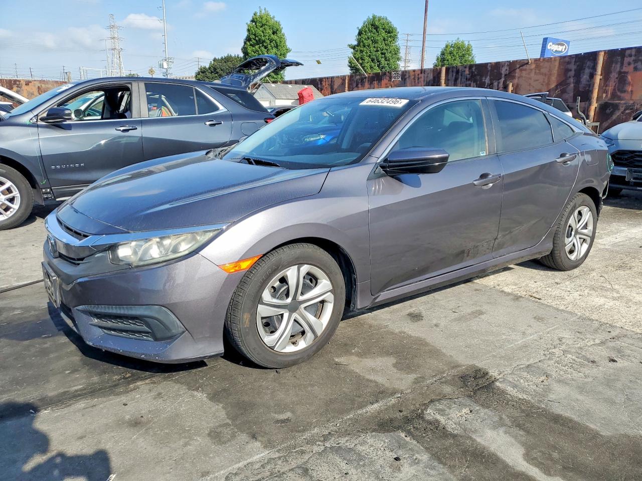 2HGFC2F51HH556097 · 2017 HONDA CIVIC
