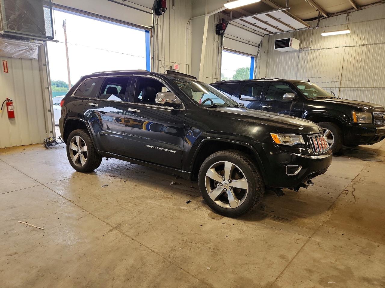 1C4RJFCG6FC877597 · 2015 JEEP GRAND CHEROKEE · 4/13