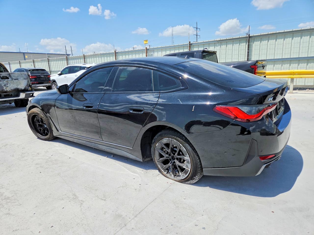 WBY43AW0XPFP65485 · 2023 BMW I4 · 2/12