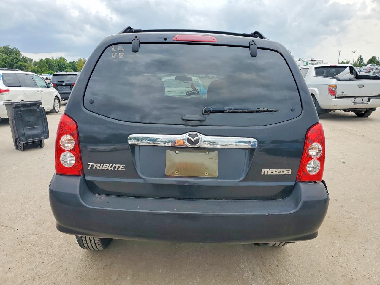 4F2YZ04156KM32382 · 2006 MAZDA TRIBUTE · 6/13