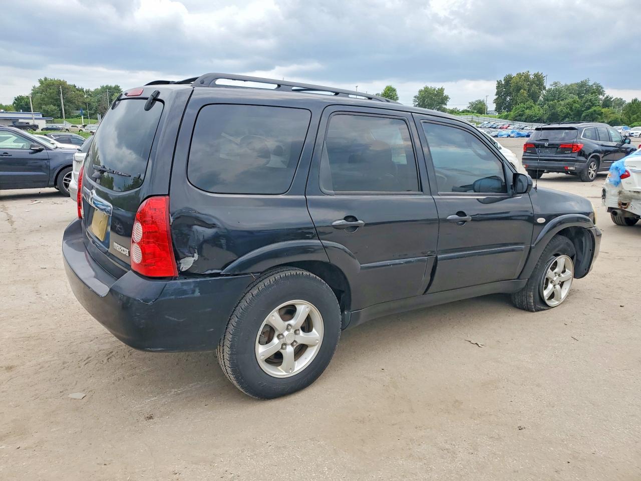 4F2YZ04156KM32382 · 2006 MAZDA TRIBUTE · 3/13