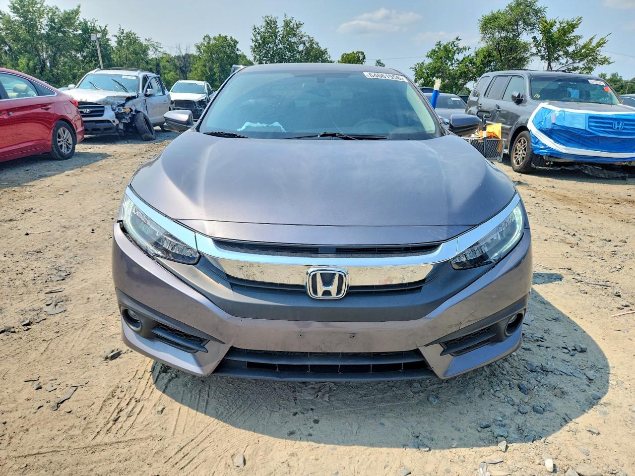 2HGFC2F75HH519099 · 2017 HONDA CIVIC · 5/12