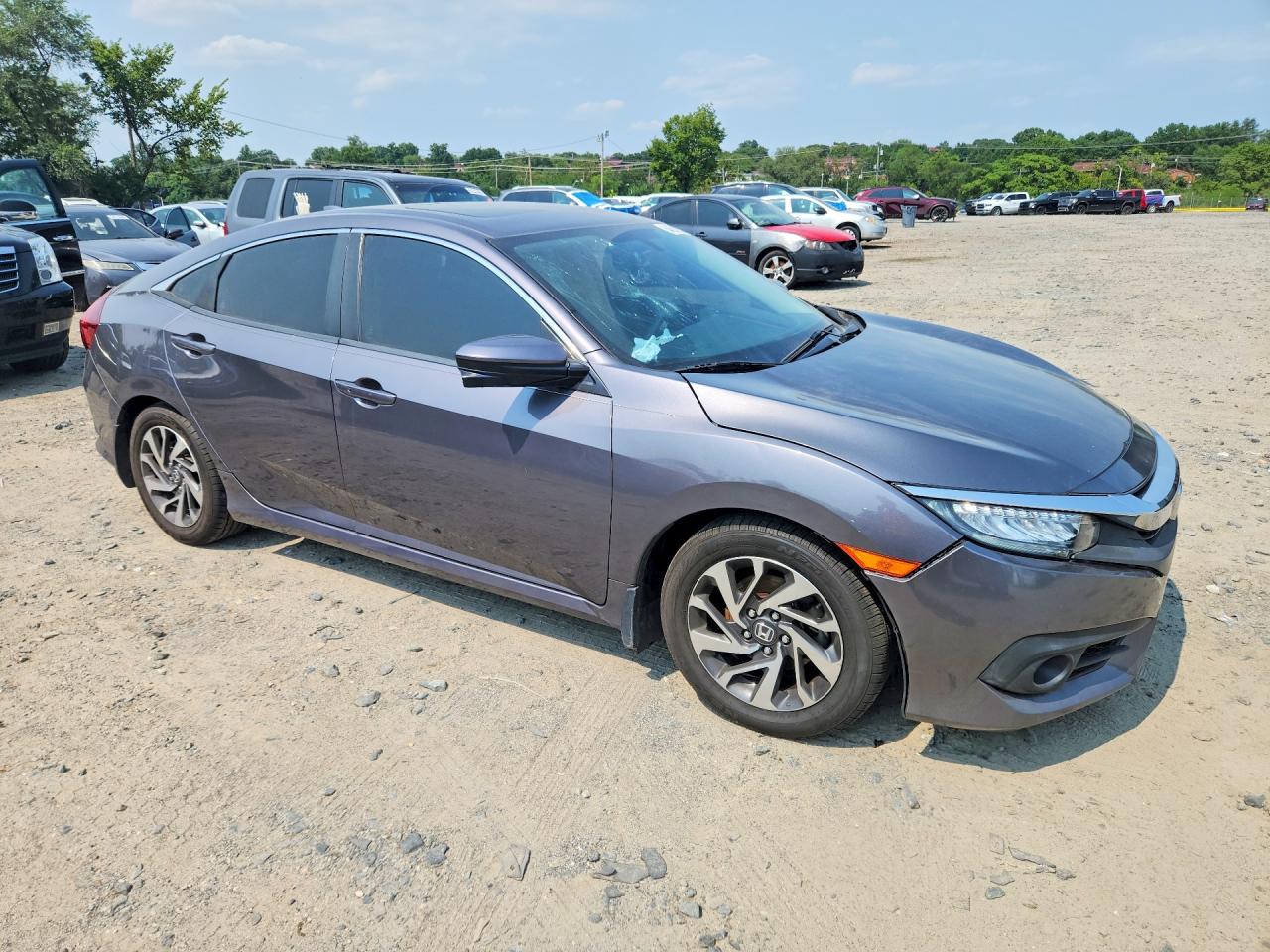2HGFC2F75HH519099 · 2017 HONDA CIVIC · 4/12