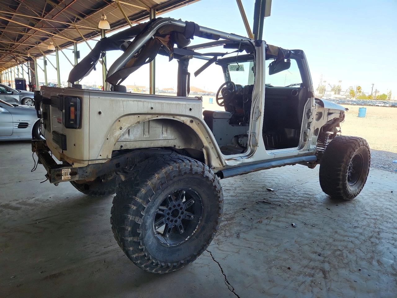 1J4BA3H19AL179671 · 2010 JEEP WRANGLER UNLIMITED · 3/13