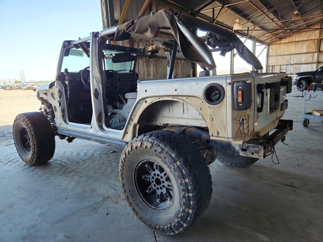 1J4BA3H19AL179671 · 2010 JEEP WRANGLER UNLIMITED · 2/13