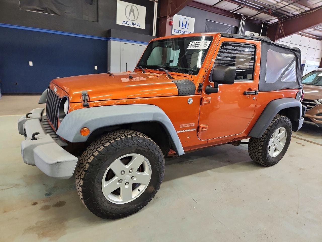 1J4AA2D18BL569142 · 2011 JEEP WRANGLER