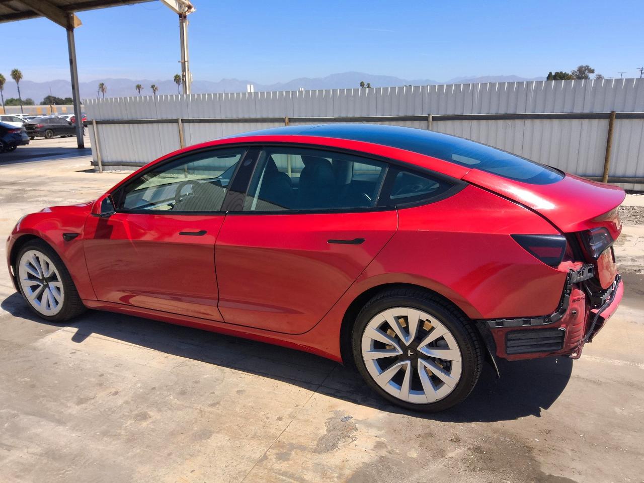 5YJ3E1EB2NF305054 · 2022 TESLA MODEL 3 · 2/13
