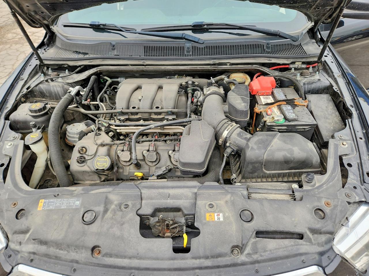 1FAHP2E80FG102154 · 2015 FORD TAURUS · 11/12