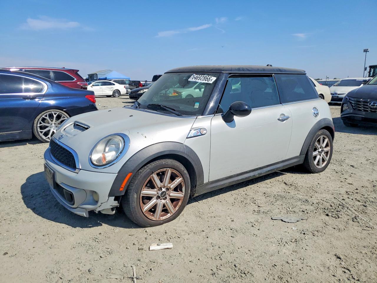 WMWSV3C58BTY15306 · 2011 MINI COOPER