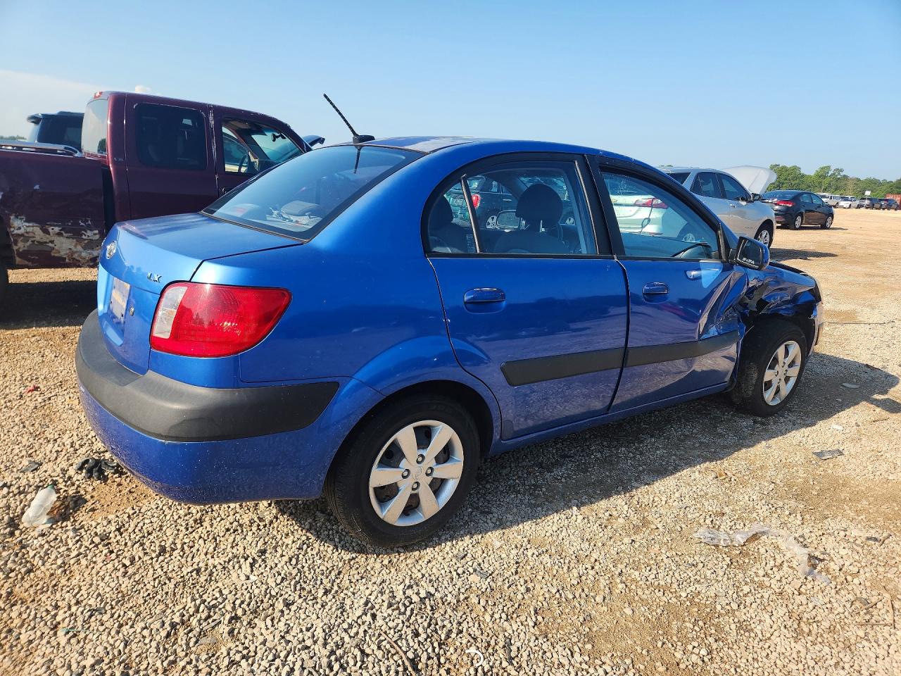 KNADE223396576100 · 2009 KIA RIO · 3/12