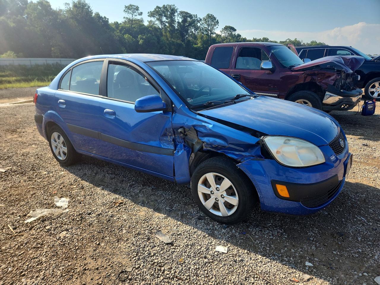 KNADE223396576100 · 2009 KIA RIO · 4/12