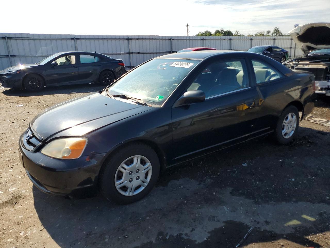 1HGEM22511L068064 · 2001 HONDA CIVIC