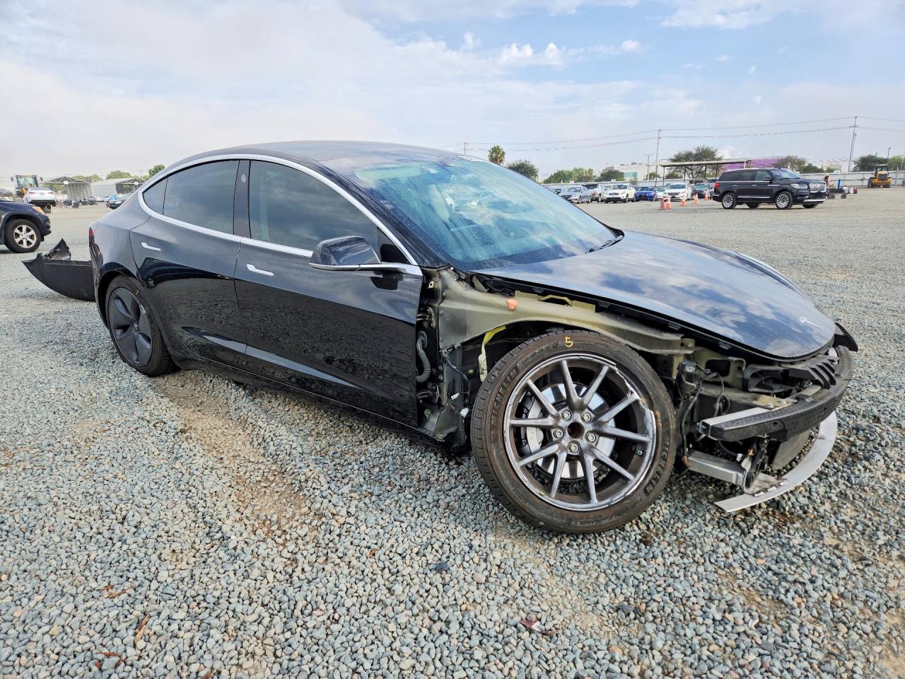 5YJ3E1EA3KF416070 · 2019 TESLA MODEL 3 · 4/13