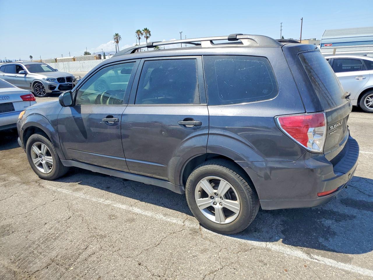 JF2SHABC5BH773762 · 2011 SUBARU FORESTER · 2/13