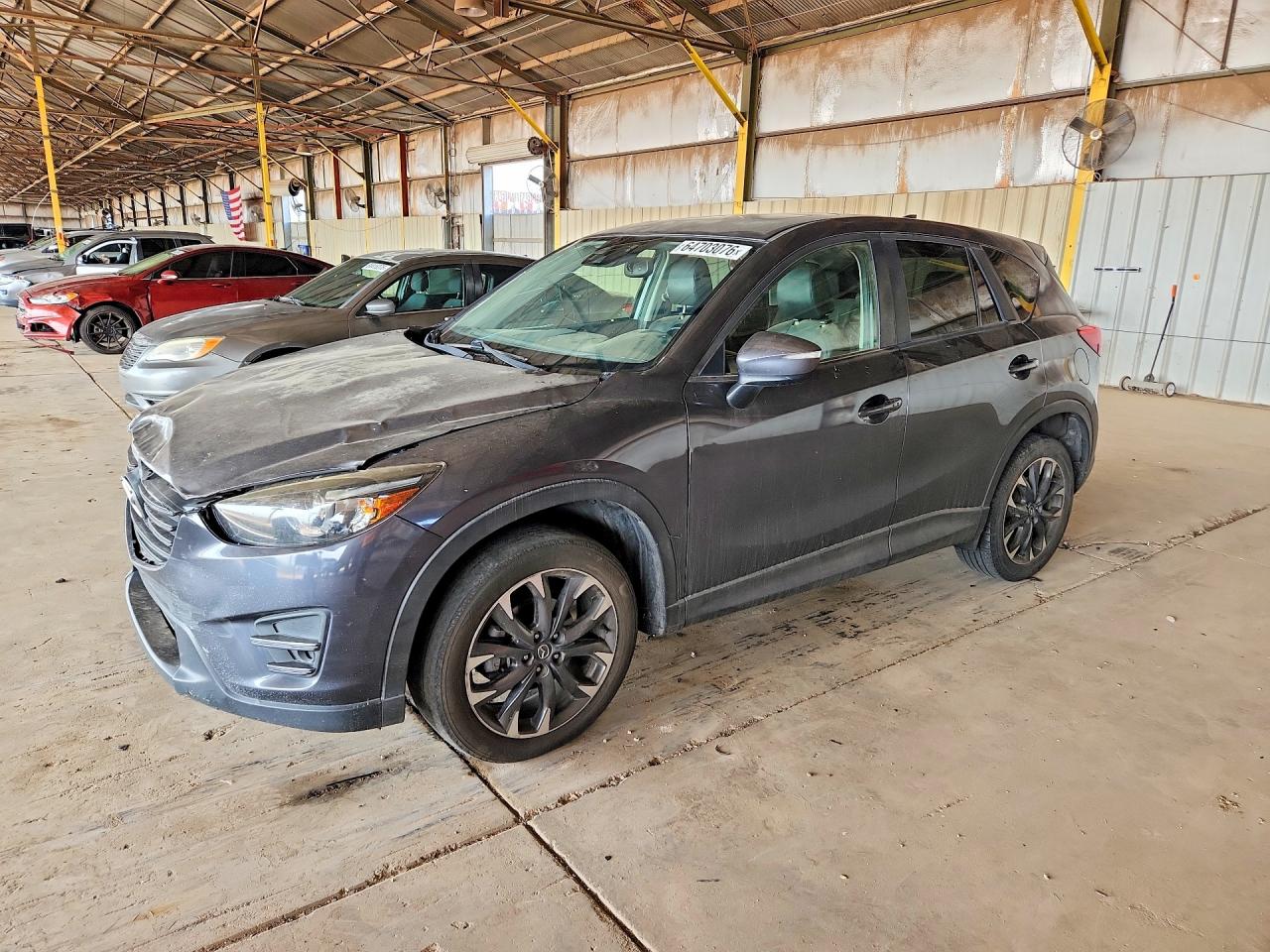JM3KE2DY0G0874629 · 2016 MAZDA CX-5