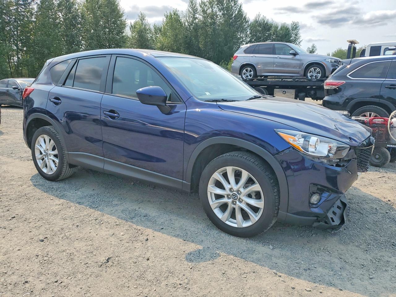 JM3KE2DY9E0384512 · 2014 MAZDA CX-5 · 4/13