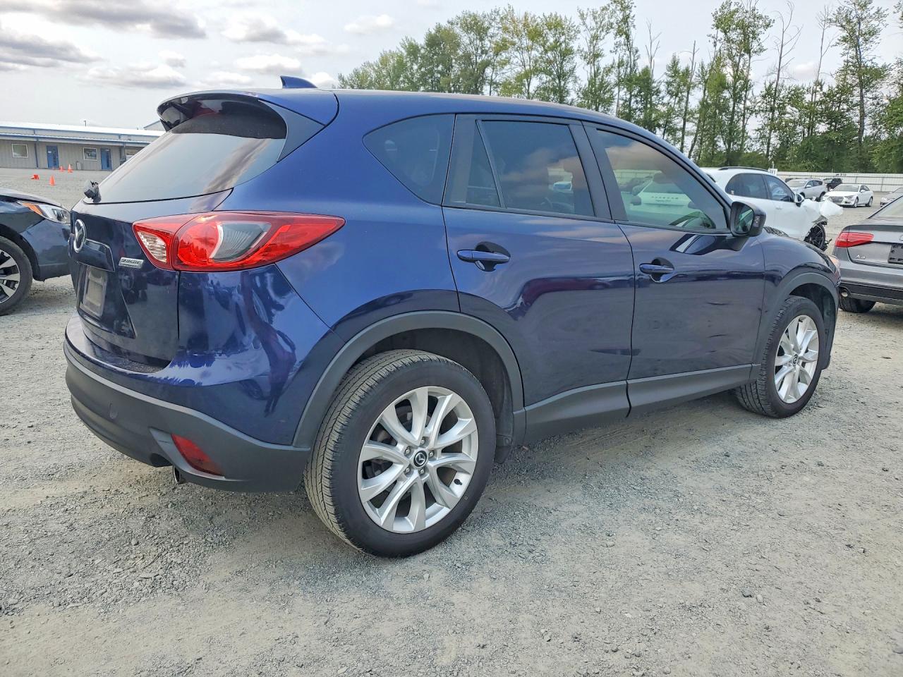 JM3KE2DY9E0384512 · 2014 MAZDA CX-5 · 3/13