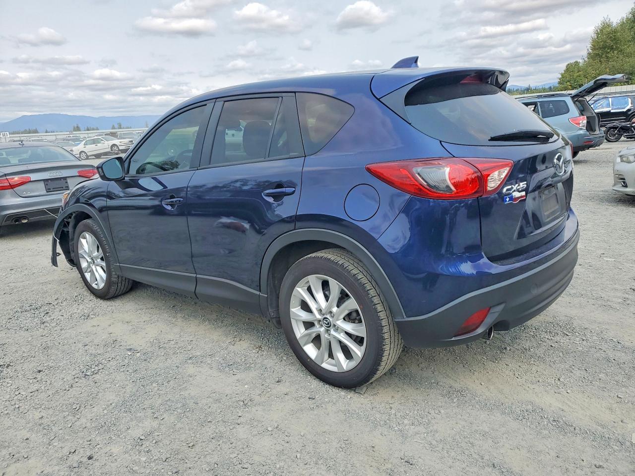 JM3KE2DY9E0384512 · 2014 MAZDA CX-5 · 2/13