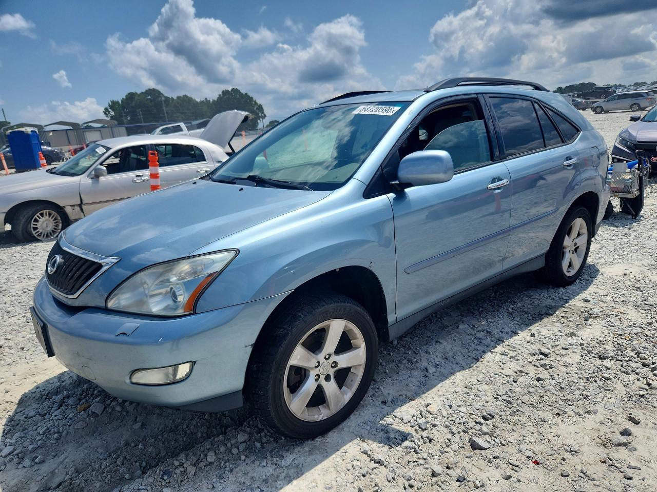 2T2HK31UX9C097805 · 2009 LEXUS RX