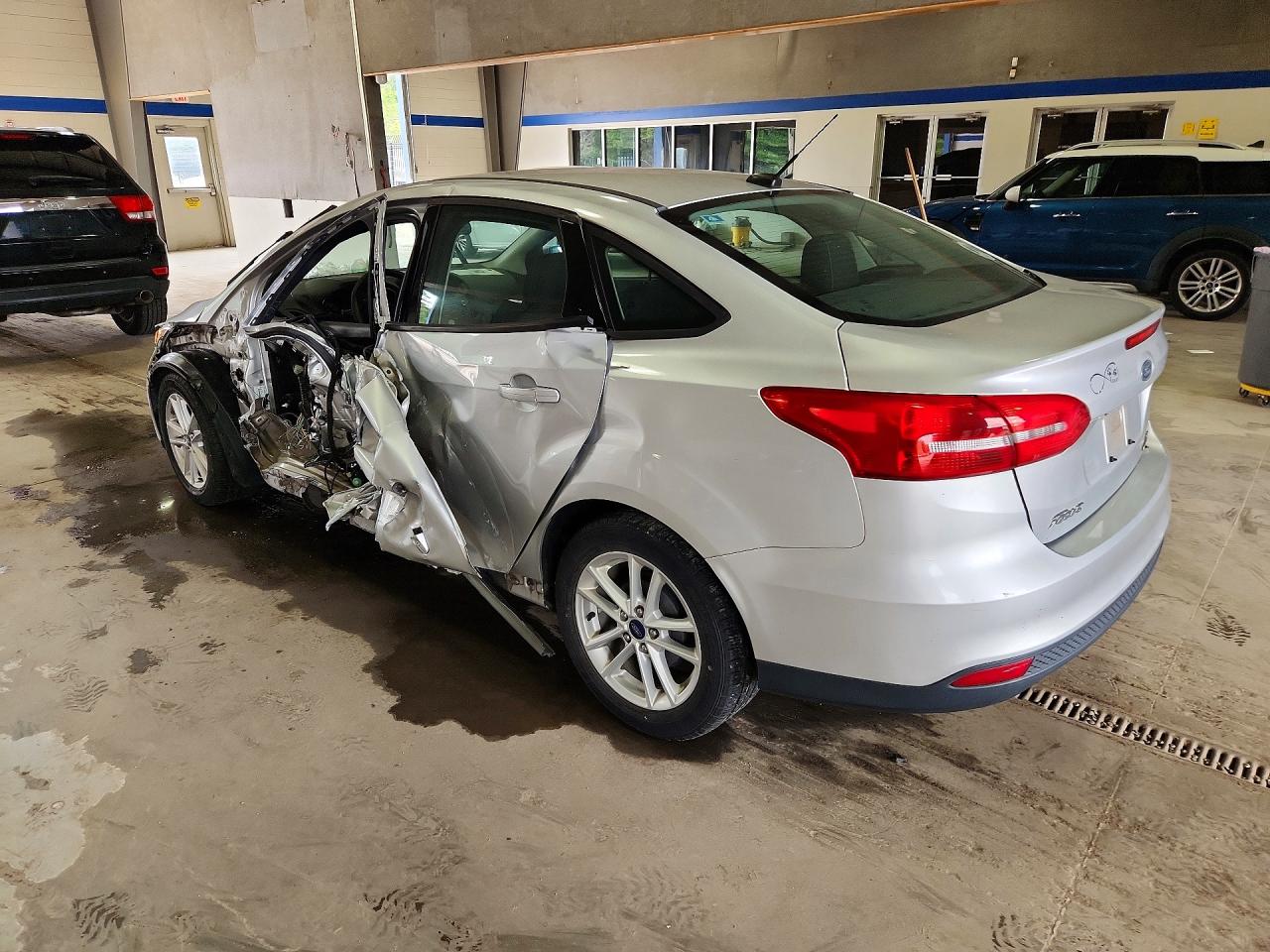 1FADP3F27GL402832 · 2016 FORD FOCUS · 2/12