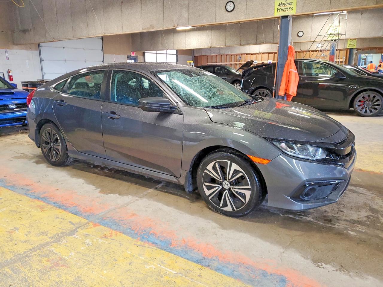 2HGFC2F66KH562767 · 2019 HONDA CIVIC · 4/12