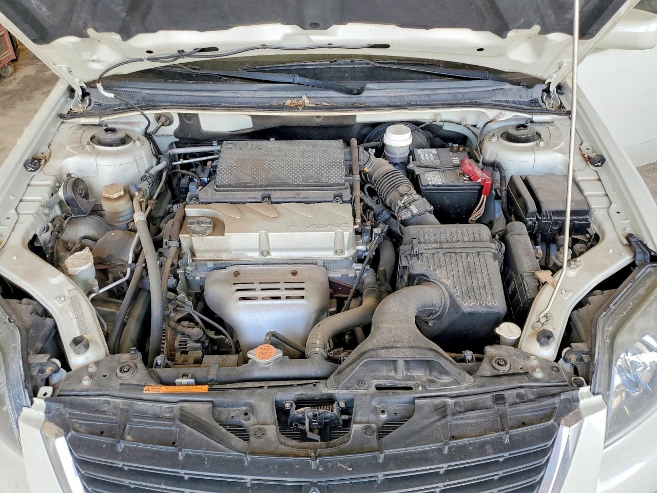 4A3AB36F09E004140 · 2009 MITSUBISHI GALANT · 11/12