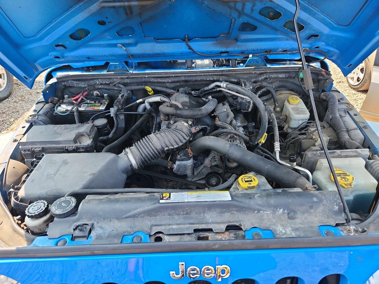 1J4AA2D11BL555468 · 2011 JEEP WRANGLER · 11/12