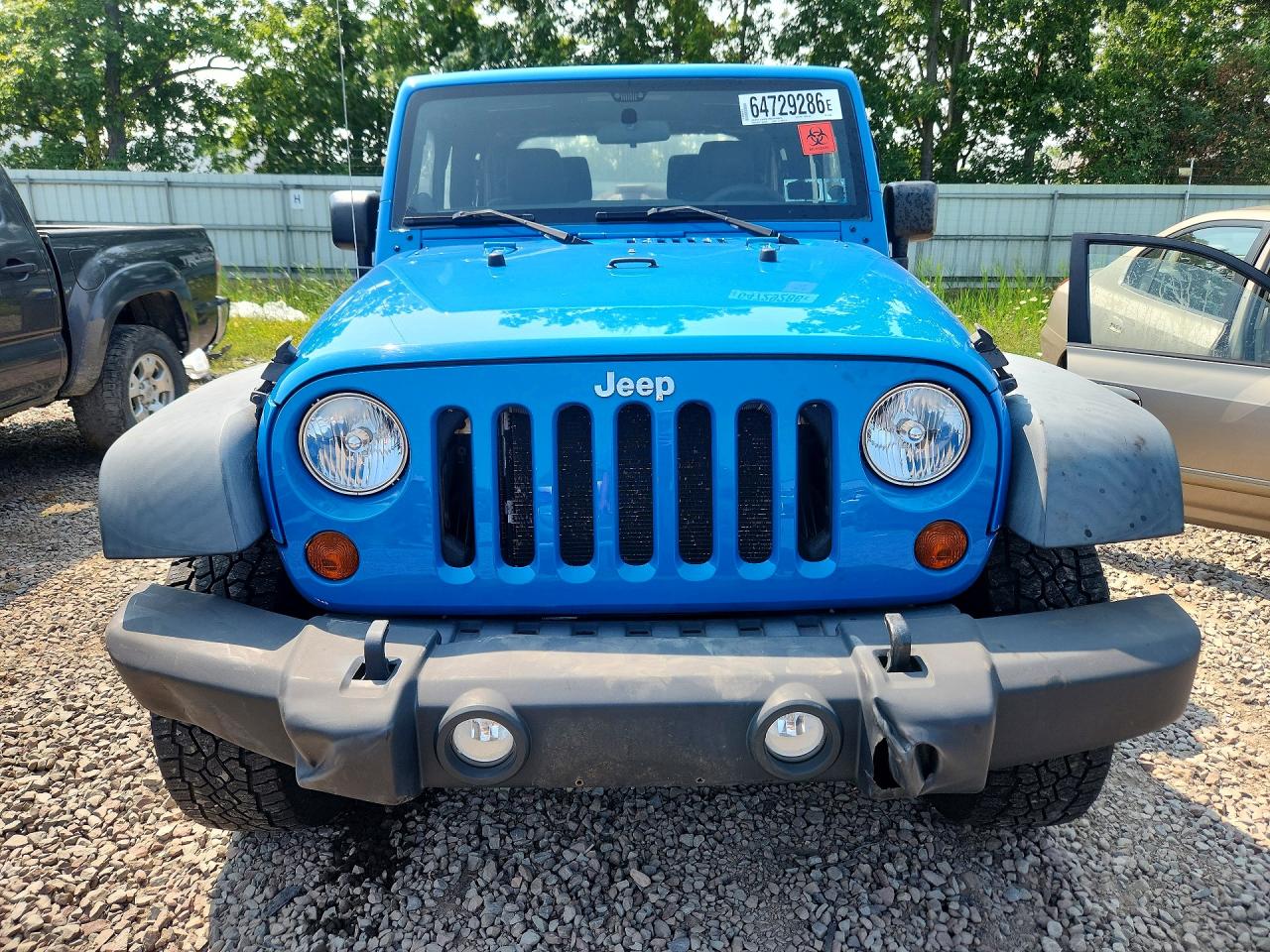 1J4AA2D11BL555468 · 2011 JEEP WRANGLER · 5/12