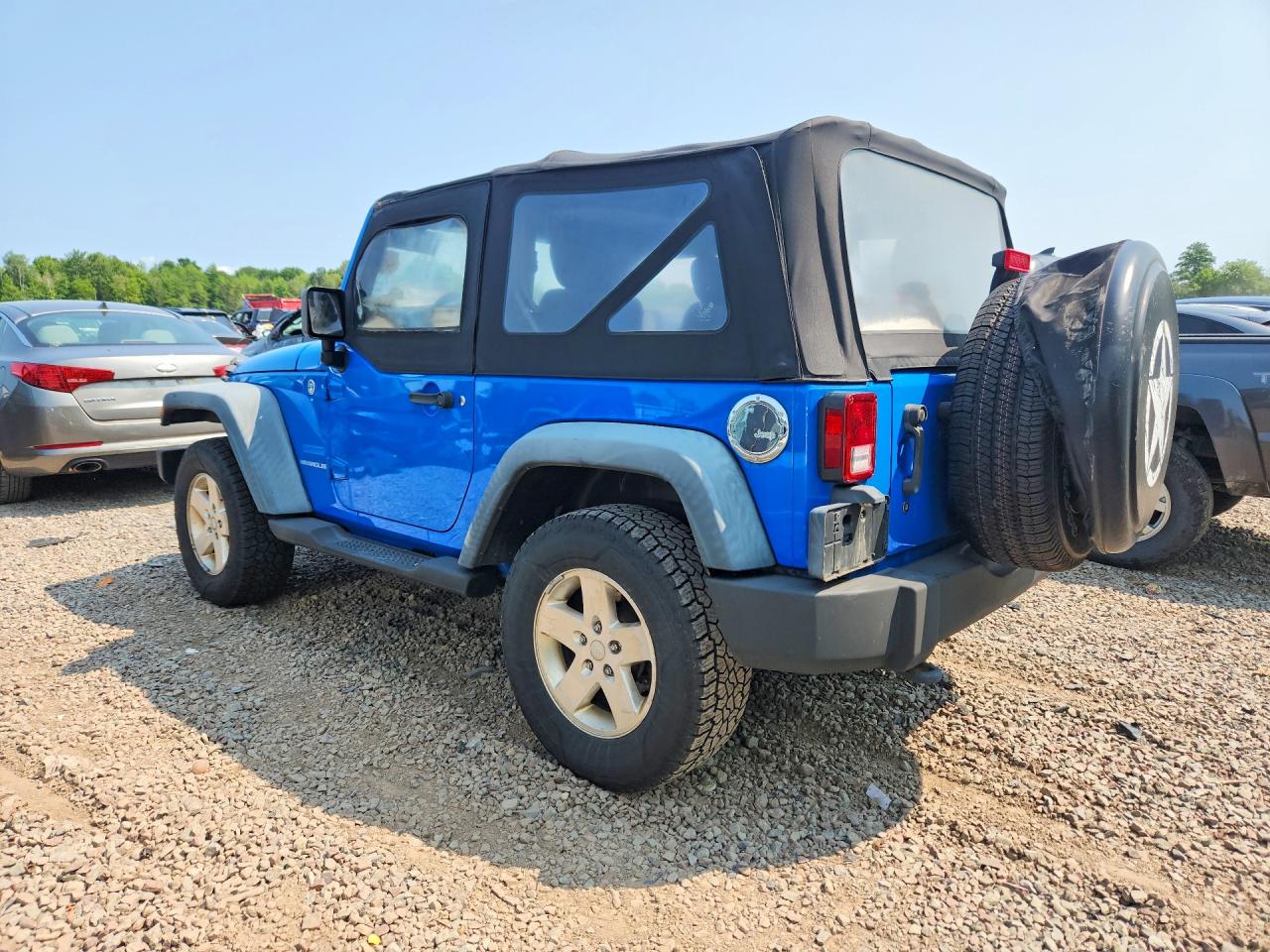 1J4AA2D11BL555468 · 2011 JEEP WRANGLER · 2/12